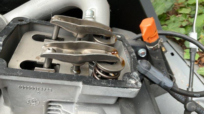 Performed scheduled preventive maintenance on a 14 KW Honeywell residential standby generator. Inspected engine assembly, solenoid actuators, linkage mechanisms, and electrical connections for proper operation and wear. Documented equipment condition with photographic records showing functional mechanical components and normal operational wear patterns.