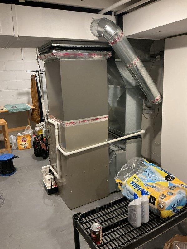 Completed comprehensive Gold AC Inspection on 2-year-old outdoor air conditioning unit. Performed full system diagnostic including refrigerant level verification, electrical component testing, condenser coil inspection and cleaning, airflow measurements, and thermostat calibration. All components operating within manufacturer specifications with no deficiencies noted. System running efficiently with proper cooling capacity and no service recommendations required at this time.