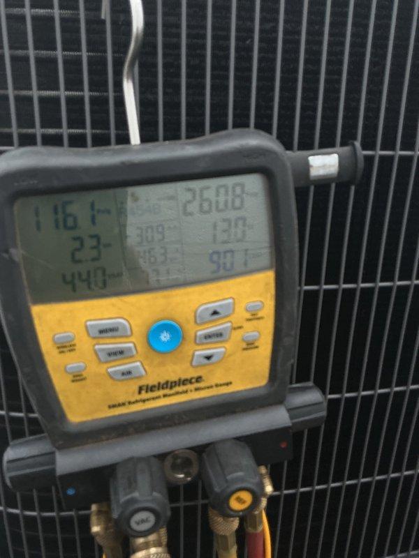 Completed full HVAC system installation including new outdoor condensing unit positioned on concrete pad against exterior wall. Unit was properly mounted, refrigerant lines connected, and system charged to manufacturer specifications. Comprehensive system diagnostics performed using calibrated testing equipment, confirming optimal operating temperatures, pressures, and performance parameters across all components.