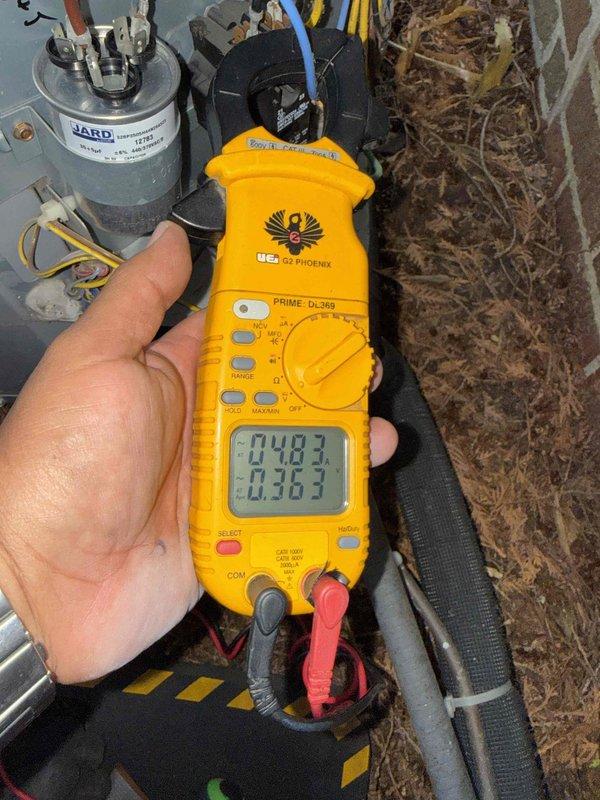 Completed comprehensive Gold AC inspection on 10+ year old Bryant HVAC system located in basement. Performed electrical diagnostics using digital multimeter, measuring capacitor performance and verifying proper voltage readings on all components. Inspected furnace unit, condensate pump assembly, PVC venting system, and associated ductwork. All equipment found to be operational with measurements within acceptable parameters for system age.