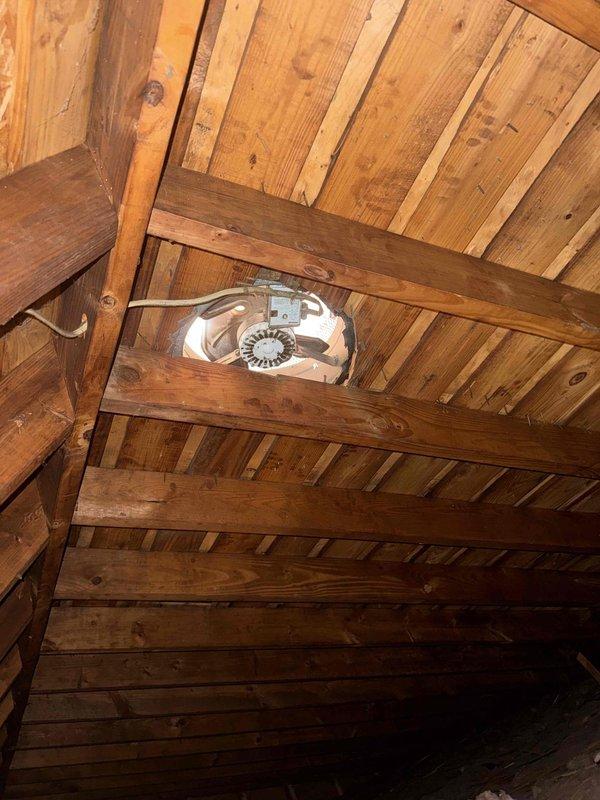 Responded to customer request to verify operational status of infrequently used porch room air conditioning unit. Performed system inspection and operational test on 18-year-old AC system. Verified unit powers on properly, compressor engages, and system effectively cools the main living area. Inspected wall-mounted air handler with exposed internal components, noting heat exchanger coils and control panel functionality. Checked attic-mounted ventilation equipment and structural mounting integrity. Confirmed no abnormal symptoms, unusual noises, or performance issues present. System operating within normal parameters for age and application.