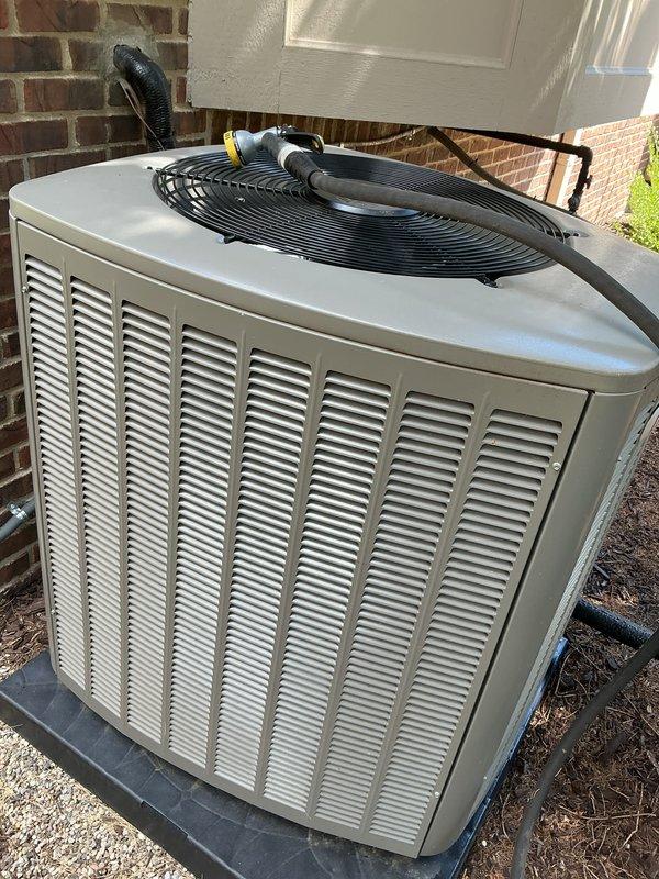 Completed comprehensive Gold AC inspection on two residential air conditioning systems, a 7-year-old unit and a 1-year-old unit, with air handler/coil located in basement. Performed thorough evaluation of both outdoor condenser units, verifying proper operation, inspecting louvered panels for adequate ventilation, checking condenser fan operation and protective grilles, and assessing overall equipment condition. Both systems found to be in working order with no immediate service needs identified at time of inspection.