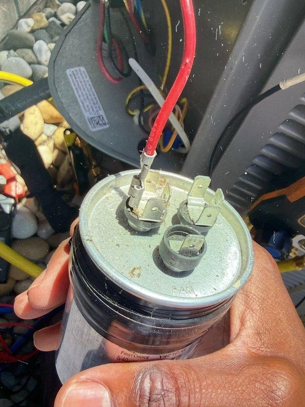 Responded to callback for condenser unit short cycling after previous service visit. Upon arrival, found 10-year-old AC system failing to maintain setpoint with indoor temperature at 76°F versus thermostat setting of 73°F. Condenser unit exhibited abnormal operation pattern—running briefly, stopping with audible noise, then restarting in repetitive cycle.

Performed diagnostic inspection of outdoor unit. Identified failed dual-run capacitor as root cause of compressor short cycling and unusual operational sounds. Capacitor showed signs of deterioration and was unable to provide proper starting and running voltage to compressor and condenser fan motor. This component failure likely occurred due to stress from refrigerant adjustment performed during previous service appointment.

Removed defective capacitor and installed new dual-run capacitor with proper microfarad rating for unit specifications. Verified all electrical connections at terminal block were secure and properly torqued. Rec
