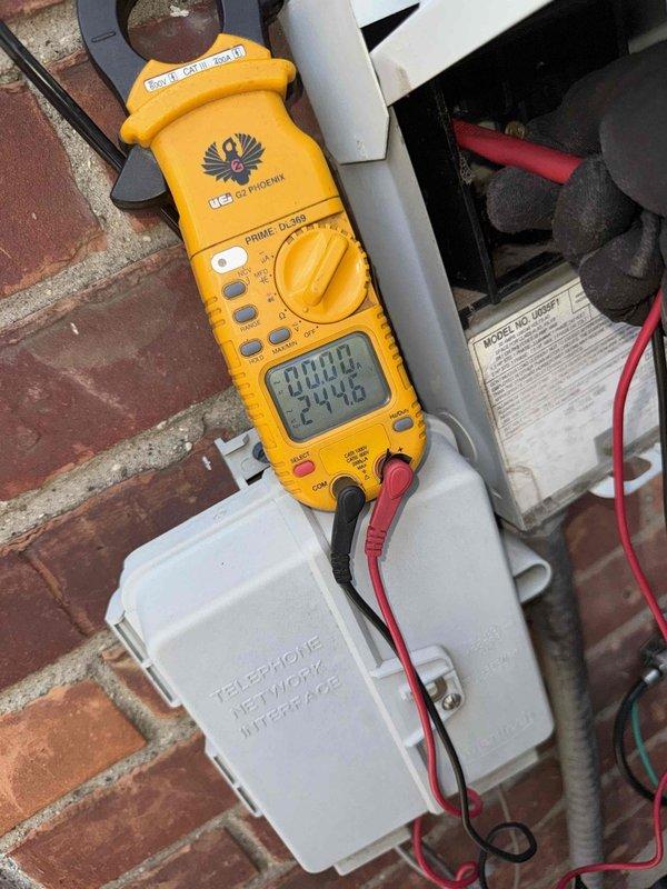 Completed comprehensive air conditioning tune-up on 24-year-old outdoor unit. Performed standard preventive maintenance protocol including electrical diagnostics with clamp meter, amperage readings, and system performance verification. Inspected condenser coil showing accumulated dirt and debris buildup, assessed condenser fan operation, and evaluated overall unit condition. System operational upon completion with all readings documented for service records.