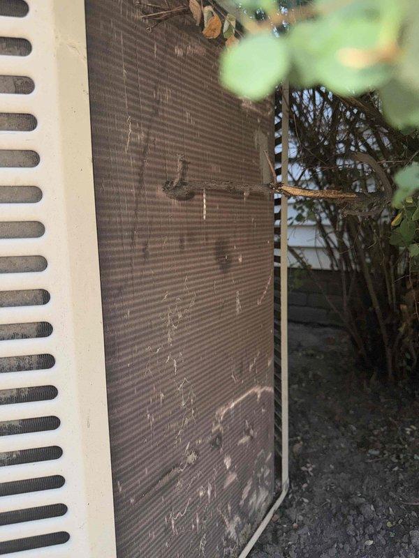 Completed comprehensive air conditioning tune-up on 24-year-old outdoor unit. Performed standard preventive maintenance protocol including electrical diagnostics with clamp meter, amperage readings, and system performance verification. Inspected condenser coil showing accumulated dirt and debris buildup, assessed condenser fan operation, and evaluated overall unit condition. System operational upon completion with all readings documented for service records.