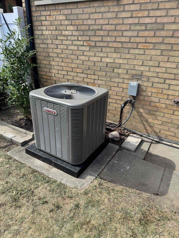 Completed full HVAC system installation including new Lennox air conditioning condenser unit and evaporator coil. Installed outdoor condenser on concrete pad with proper electrical disconnect and conduit connections per code requirements. Mounted new evaporator coil to existing furnace system in interior mechanical closet, performed refrigerant line flush, and installed new thermostat. System tested and verified operational with proper airflow and cooling capacity.