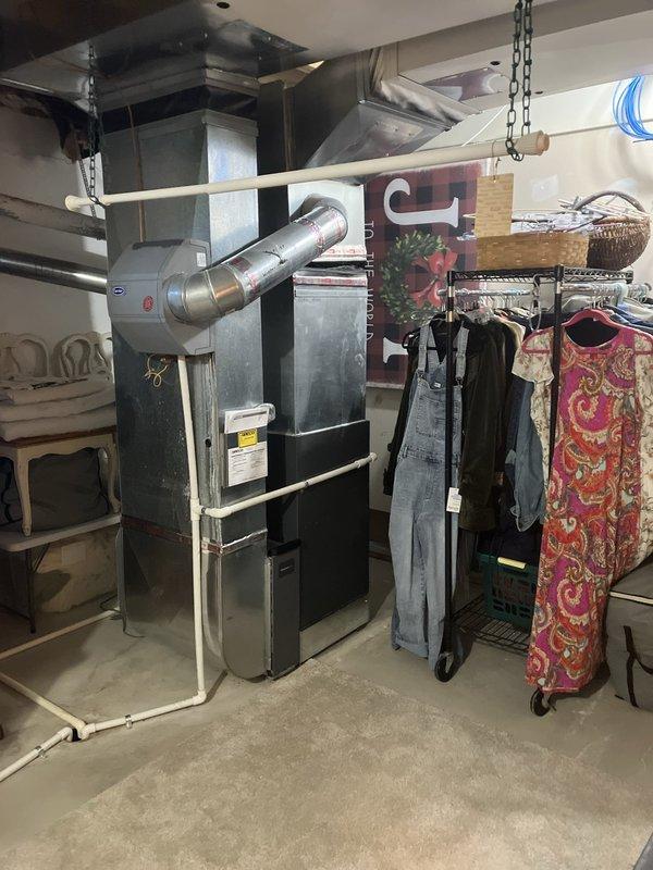Responded to no cooling condition with outdoor condenser unit not operating while indoor blower continued to run. Performed diagnostic evaluation of split system air conditioning equipment and determined condenser failure required full system replacement. Completed installation of new HVAC system including outdoor condensing unit and indoor air handler with associated refrigerant lines, electrical connections, and ductwork integration in basement mechanical space.