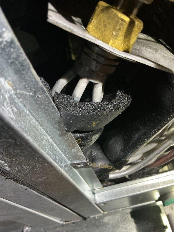 Responded to service call for 3-year-old AC unit experiencing compressor short cycling. Inspected equipment located in attic and backyard areas. Examined refrigerant lines, control components, and system connections. Assessed Cross Super Feed valve assembly and associated copper refrigerant piping for proper operation. Verified mounting brackets, insulation integrity, and mechanical connections throughout the system to identify cause of compressor cycling issue.