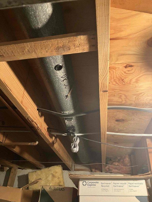 Completed installation of multi-zone HVAC system in residential property. Installed zone control dampers and ductwork in attic space, including mounting control panels and running necessary metal ductwork through existing structural framing. All components were properly secured with metal strapping, electrical connections were made to zone control equipment, and system was tested for proper operation across all zones.