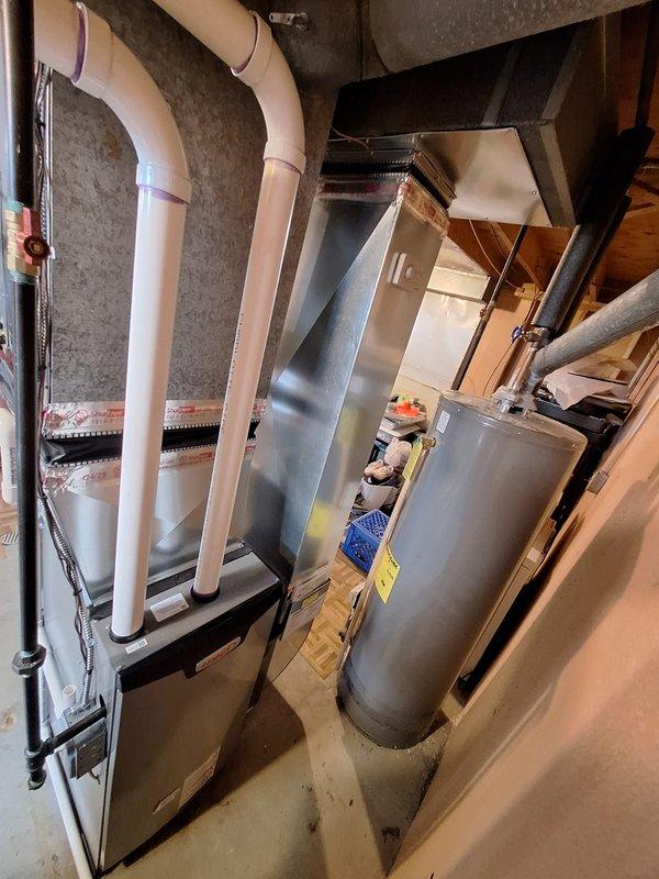 Completed full furnace installation in basement mechanical room, including air handler unit with PVC condensate drainage system and proper venting. Coordinated Michigan Saves financing approval and submitted permit application for utility rebate eligibility. All loan documentation processed electronically and identification verification completed per program requirements.