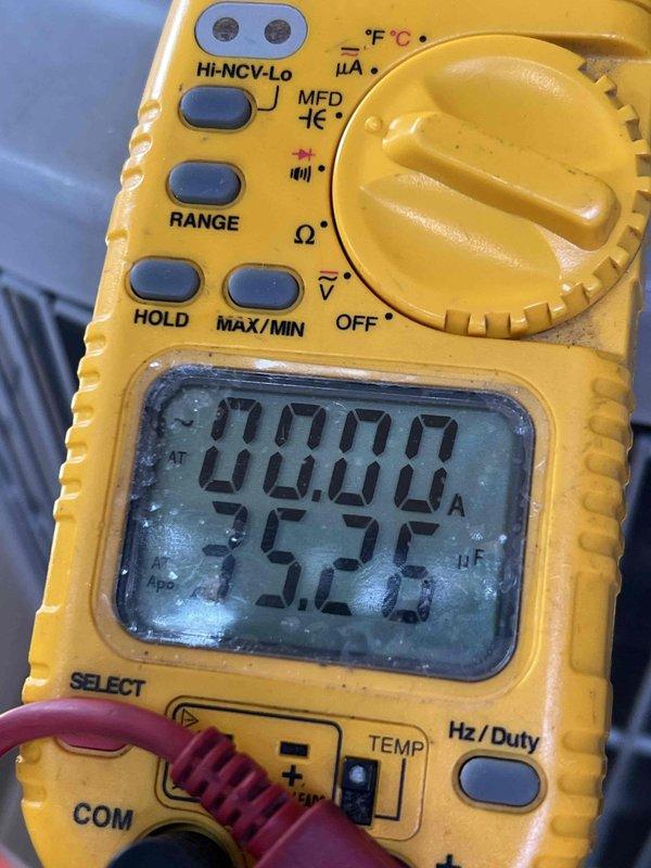 # HVAC Maintenance - Gold AC Inspection

Completed comprehensive Gold AC inspection on a 12-year-old air conditioning system with air handler located in basement. Equipment was operational at time of service. Performed detailed diagnostic testing using digital multimeter to verify system performance parameters.

## Inspection Activities Performed

Conducted thorough visual inspection of air handler and associated components in basement location. Verified equipment operational status prior to beginning diagnostic procedures. Utilized professional-grade digital multimeter to measure and document critical system parameters.

Measured capacitor values using capacitance testing function on multimeter, recording readings in microfarads (μF) to verify proper capacitor operation and identify any degradation in electrical components. Capacitor testing is essential for 12-year-old equipment to ensure reliable compressor and fan motor operation.

Performed temperature measurements of supply air, 