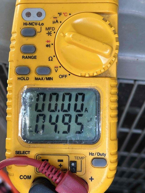 # HVAC Maintenance - Gold AC Inspection

Completed comprehensive Gold AC inspection on a 12-year-old air conditioning system with air handler located in basement. Equipment was operational at time of service. Performed detailed diagnostic testing using digital multimeter to verify system performance parameters.

## Inspection Activities Performed

Conducted thorough visual inspection of air handler and associated components in basement location. Verified equipment operational status prior to beginning diagnostic procedures. Utilized professional-grade digital multimeter to measure and document critical system parameters.

Measured capacitor values using capacitance testing function on multimeter, recording readings in microfarads (μF) to verify proper capacitor operation and identify any degradation in electrical components. Capacitor testing is essential for 12-year-old equipment to ensure reliable compressor and fan motor operation.

Performed temperature measurements of supply air, 