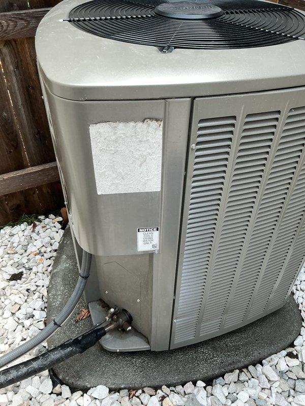 Completed comprehensive Gold AC inspection on 3-year-old residential air conditioning system with outdoor condenser unit and basement air handler. Performed full system diagnostics using digital manifold gauges to measure refrigerant pressures and temperatures, verifying proper charge levels and system performance. Inspected outdoor condenser unit positioned on concrete pad, confirming proper airflow through louvered panels, operational fan assembly, and secure refrigerant line connections. Evaluated electrical disconnect, examined condensate drainage, and assessed overall equipment condition. System operating within manufacturer specifications with no deficiencies noted at time of inspection.