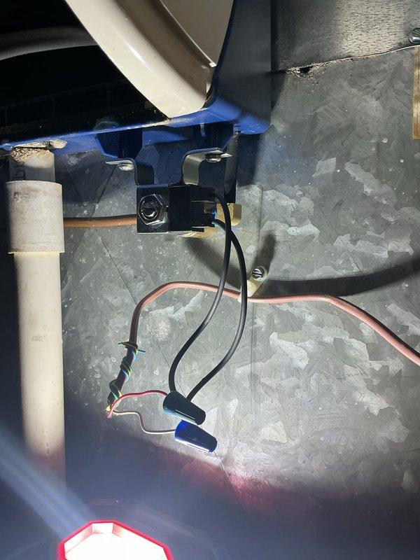 Responded to furnace water leak in basement following power outage. Upon inspection, found humidifier solenoid valve failing to close properly, allowing continuous water flow into the humidifier pad and overflow into the furnace cabinet. Replaced faulty solenoid valve and verified proper operation through multiple test cycles. Inspected furnace interior for water damage, checked electrical connections for moisture exposure, and confirmed all components functioning correctly. System restored to normal operation with no further leakage detected.