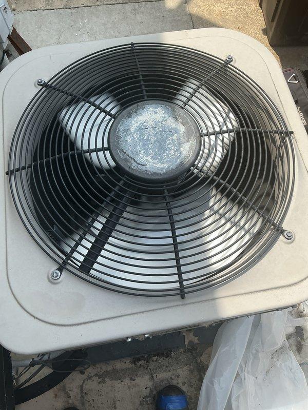Completed comprehensive Gold AC and furnace inspection on 10+ year old HVAC system with outdoor condenser unit and basement-located air handler. Performed thorough visual examination of gas furnace internal components including burner assembly with operational blue flame openings, gas valve assembly with proper wire connections, blower motor assembly, and PVC condensate drainage system. Inspected outdoor condenser unit including fan motor operation, protective wire guard integrity, and overall cabinet condition showing normal weathering consistent with age. All equipment found operational with no immediate safety concerns identified. Documented system condition with photographic evidence showing standard wear patterns appropriate for equipment age. Both heating and cooling systems confirmed functional at time of inspection.