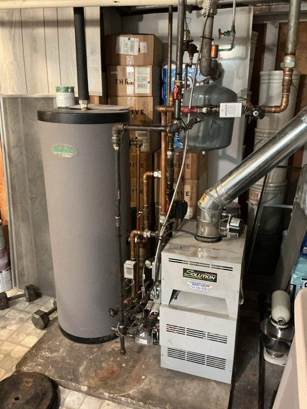 Responded to no-heat call on 12-year-old boiler system located in basement that also supplies domestic hot water. Diagnosed failed limit switch preventing boiler operation, resulting in loss of both space heating and hot water for several weeks. Limit switch ordered under PO 1348934-001 for replacement to restore full system functionality.