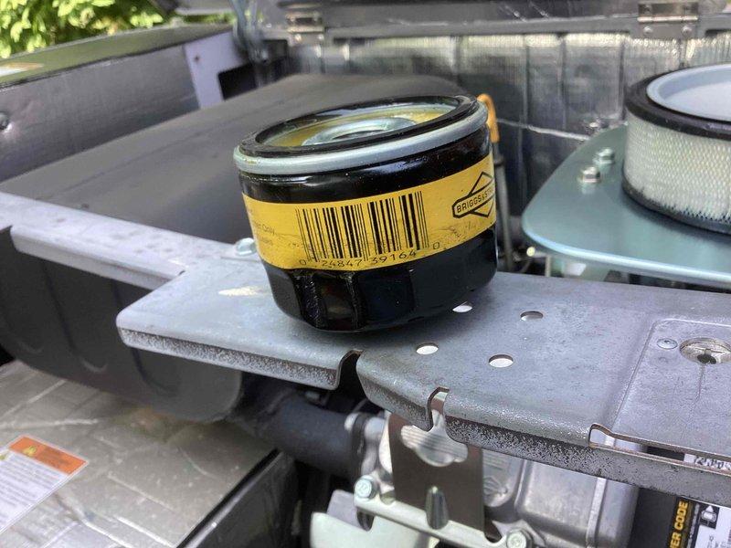 Completed scheduled preventive maintenance on two generators and four air conditioning units. Performed filter replacements on all equipment, including air intake filters and oil filters as shown in documentation photos. Inspected all units for proper operation, checked fluid levels, and verified system performance parameters were within manufacturer specifications.