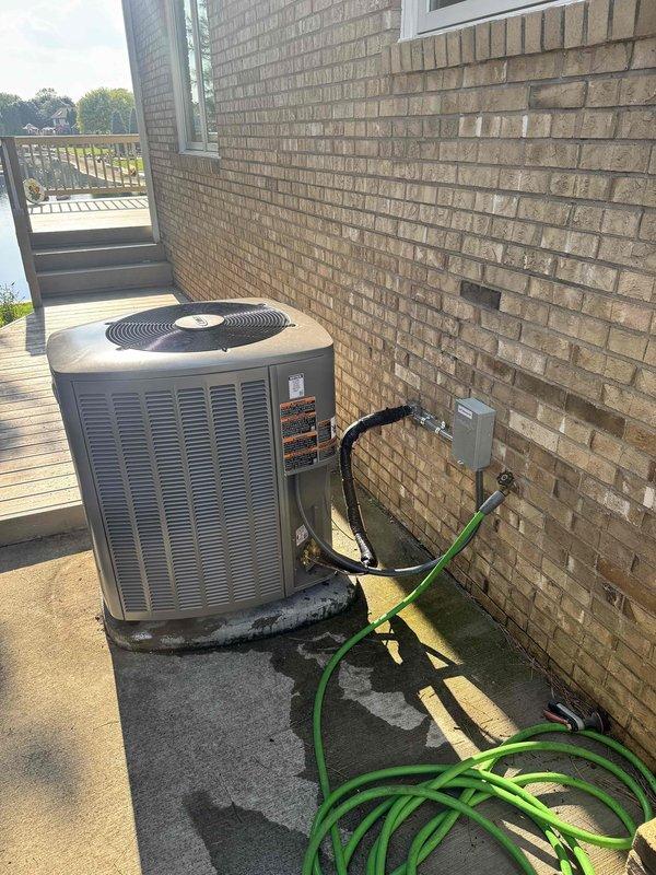 Completed installation of 5-ton air conditioning system with matching evaporator coil in left-side configuration. Installed new outdoor condensing unit on concrete pad with proper refrigerant line routing and electrical disconnect, and indoor coil assembly with containment system for debris control during installation. Obtained mechanical and electrical permits, reconnected all electrical components per code requirements, and performed final system measurements to verify proper operation and refrigerant charge.
