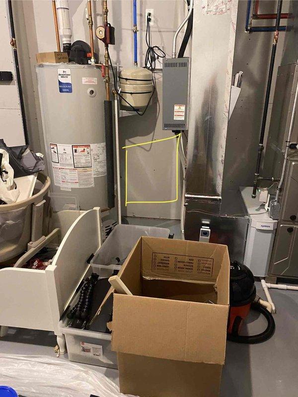 Conducted on-site assessment for whole home dehumidifier installation in residential property with existing forced air system. Evaluated basement mechanical room containing furnace, water heater, and associated HVAC infrastructure to determine optimal placement and integration requirements for dehumidifier unit. Documented existing equipment configuration and available space for installation planning.