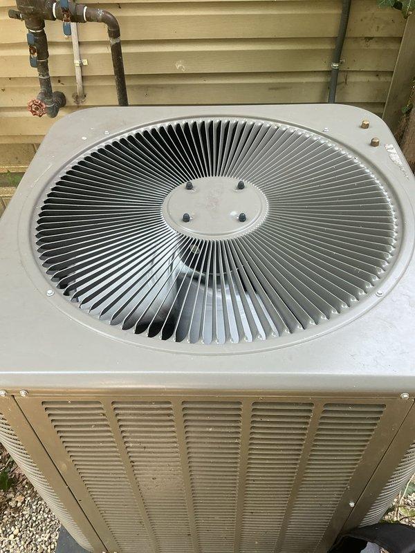Responded to no cooling complaint on 2-year-old residential AC system affecting entire home. Upon arrival, performed complete system diagnostic including visual inspection of outdoor Lennox condenser unit and indoor furnace/air handler in basement. Condenser unit appeared in good physical condition with clean coils and proper clearances; both copper refrigerant lines showed appropriate insulation with no visible damage or refrigerant leaks at service valves. Verified power supply to both indoor and outdoor units, checked thermostat operation and settings, and measured system pressures and temperatures. Indoor unit connections, electrical components, and ductwork inspected without abnormalities noted. System successfully restored to proper cooling operation and tested through complete cycle to verify adequate airflow and temperature differential across evaporator coil.