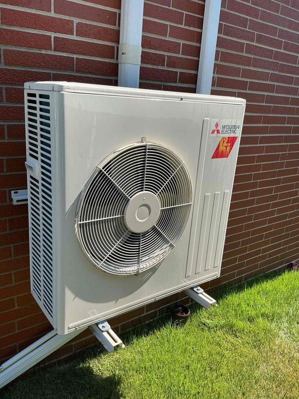 Completed comprehensive Gold AC inspection on two residential air conditioning systems: a 10-year-old Bryant unit and a 5-year-old Mitsubishi Electric unit. Both outdoor condenser units were evaluated for operational performance, with one air handler located in the attic requiring ladder access and the second system's air handler positioned outside. All components were inspected, tested, and photographed, with both systems found to be in functional condition. Advised property owner to maintain clear area around condensers, removing any debris and animal waste to ensure proper airflow and optimal equipment performance.