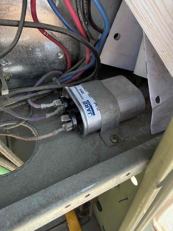 Responded to commercial rooftop unit not cooling properly. Upon inspection, found failed run capacitor preventing compressor operation. Replaced defective capacitor, verified proper electrical connections, and tested system operation. Unit now cooling effectively with all components functioning within manufacturer specifications.