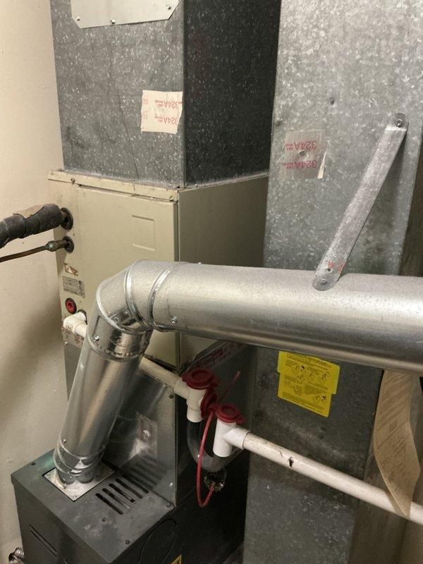 Responded to service call for central air conditioning system with no cooling capability. Upon inspection, evaluated existing HVAC equipment in mechanical room and exterior condenser unit at multi-unit building. Assessed system components including ductwork, venting, and outdoor condensing unit. Determined system required full replacement rather than repair. Provided estimate for complete HVAC system replacement including new air handler, condenser unit, refrigerant lines, and associated components necessary to restore cooling functionality to the property.