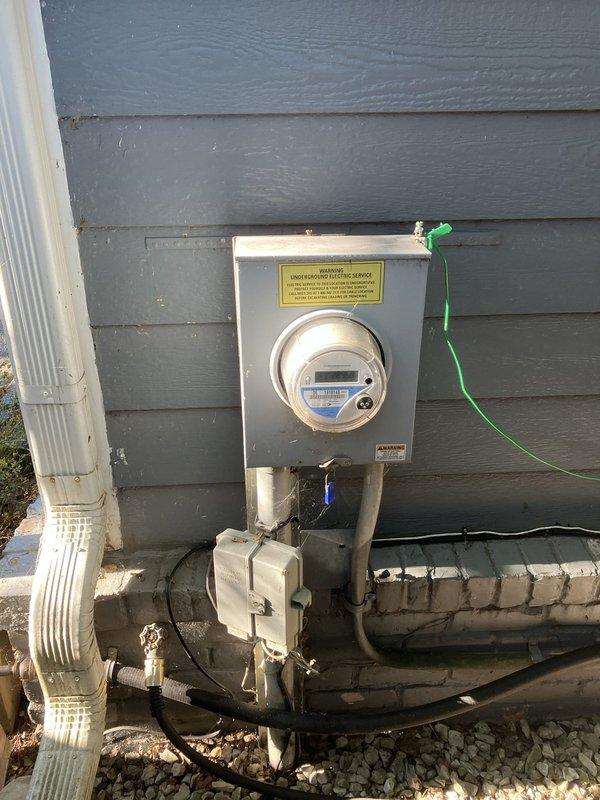 Conducted comprehensive evaluation for dual HVAC system replacement including two air conditioning units and furnaces. Customer reported primary air conditioner running continuously without achieving desired temperature setpoint and failure to provide power to Nest thermostat C-wire connection. Assessed existing electrical service panel and meter installation for capacity requirements to support new dual system configuration. Inspected current ductwork infrastructure including main trunk lines and plenum connections serving multiple zones. Documented existing System #3 installation location in mechanical room with metallic ductwork and plenum assembly. Evaluated electrical supply routing, conduit pathways, and available connection points for new equipment installation. Provided detailed estimate for complete replacement of both cooling and heating systems to address inadequate cooling performance and thermostat power issues.
