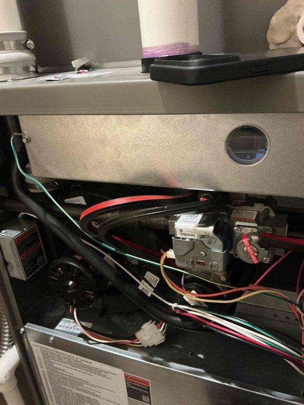 Completed comprehensive Gold Furnace Inspection on forced air heating system located in main floor utility room with easy access. Performed full system evaluation including visual inspection of all major components, gas valve assembly, electrical connections, and control mechanisms. Unit is operational with no immediate concerns identified at time of inspection.