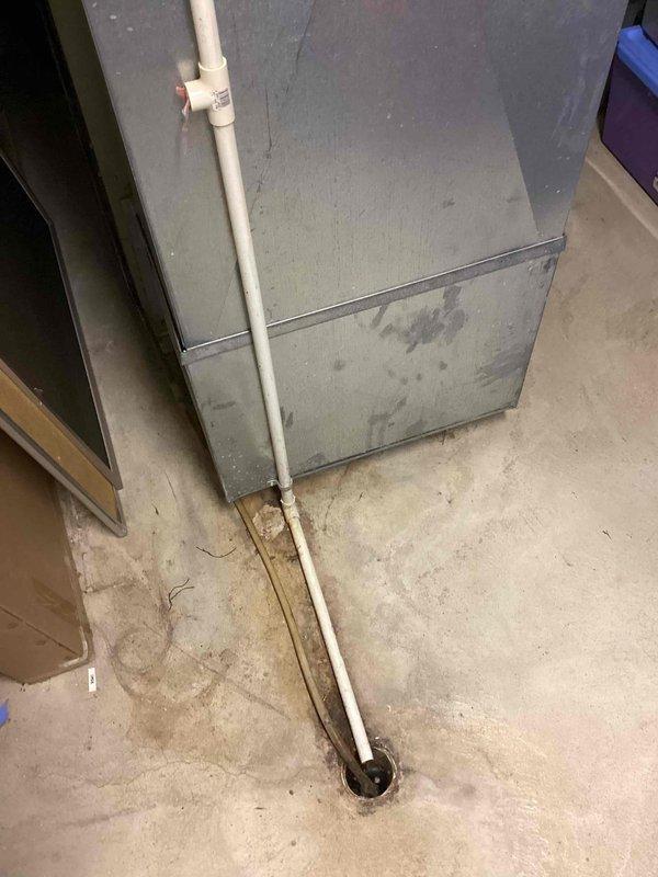 Provided comprehensive estimate for complete HVAC system replacement including natural gas furnace and air conditioning unit for 10+ year old equipment currently located in basement. Assessed existing operational system with outdoor condensing units and indoor air handler, evaluated PVC condensate drainage, electrical disconnects, and existing conduit routing to determine specifications for new high-efficiency equipment installation.