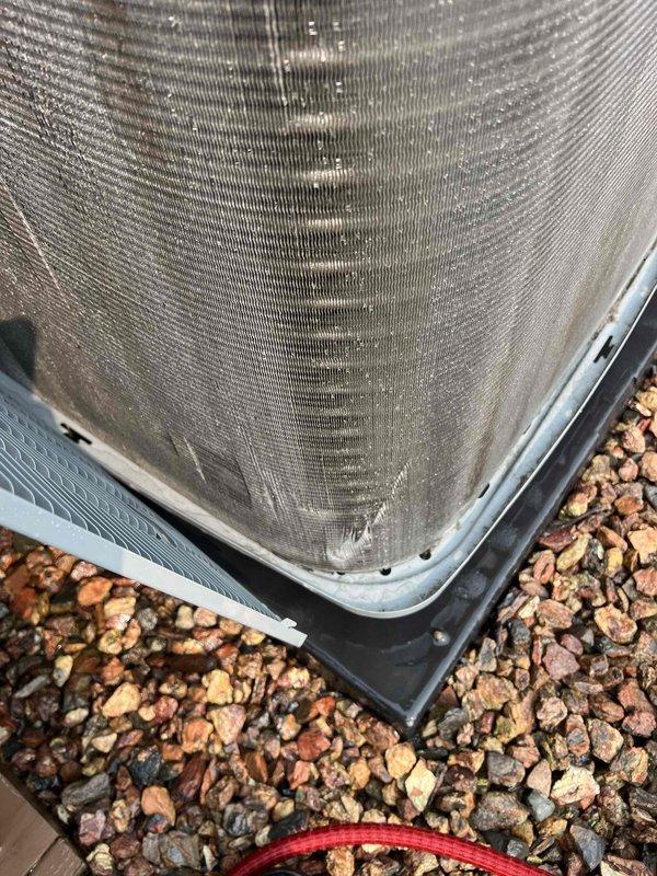 Responded to callback for three-year-old air conditioning system that continued to experience cooling failure after previous service visit. Confirmed compressor failure diagnosis and verified warranty coverage for replacement component. Compressor ordered and staged at Williams Distributing Southfield under PO 1351906-001 for installation. Documented condenser unit condition and evaporator coil assembly with photographic evidence showing accumulated debris on outdoor unit mesh panel and dust buildup on indoor coil fins, which may have contributed to system stress prior to compressor failure.