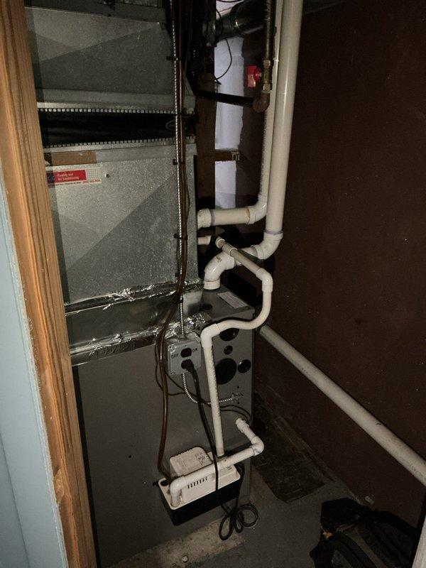 Responded to service call for air conditioning system not turning on. Performed diagnostic inspection of outdoor condenser unit and indoor air handler with basement coil configuration. Assessed electrical connections, thermostat communication, and overall system functionality to identify root cause of no-start condition and restored cooling operation.