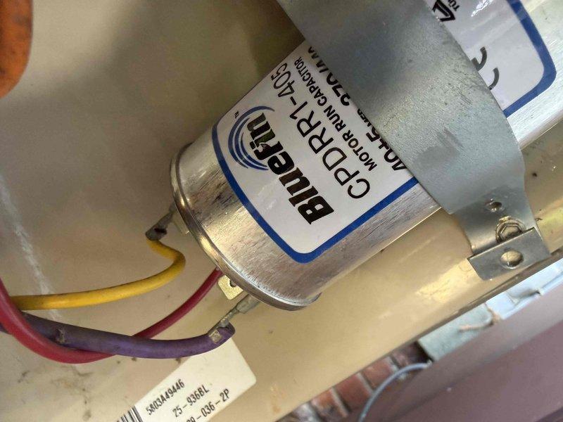 Responded to service call for 10+ year old cooling system located in basement. Assessed condenser unit with failed fan motor and provided quote for replacement motor and installation. Inspected outdoor condenser unit showing normal wear with debris accumulation around base, and examined interior electrical components including dual-run capacitor with proper wire connections. Coordinated parts availability through supplier and prepared equipment for scheduled motor replacement upon customer approval.