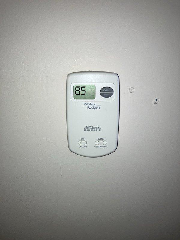 Completed estimate for replacement of 23-year-old R22 cooling system and furnace located on first floor after air conditioning failure. Assessed existing HVAC installation including vertical ductwork, gas lines, and thermostat controls, documenting equipment condition and configuration for full system replacement proposal.
