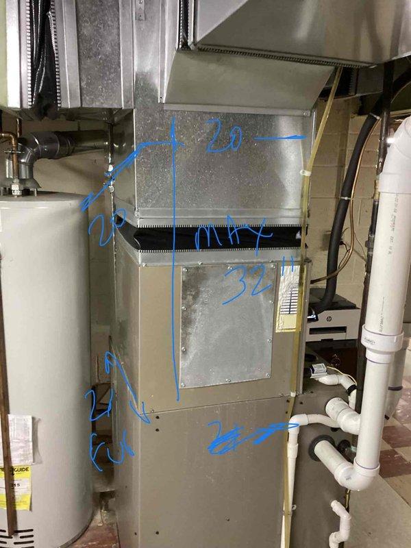 Performed comprehensive evaluation of residential HVAC system including 2009 air conditioning unit operating with excessive runtime and reduced efficiency. Conducted thorough inspection of outdoor condenser unit, indoor evaporator coil located near basement furnace, and associated air handler equipment. Identified low refrigerant charge condition affecting system performance. Documented equipment configuration with detailed measurements and markings on air handler unit for replacement specifications. Inspected Generac standby generator in backyard for operational status. Photographed electrical service connection, meter installation, and complete HVAC equipment setup including ductwork, water heater proximity, and mechanical room layout. Provided replacement estimate recommendations based on equipment age, current operating conditions, and system inefficiencies.