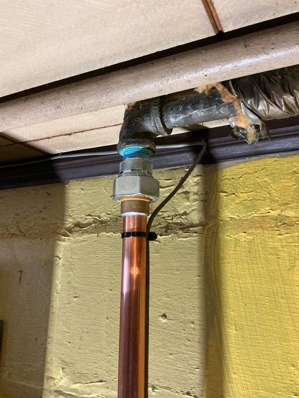 Completed water meter repairs in coordination with municipal water shut-off. Replaced deteriorated meter assembly and associated piping connections in basement utility area. Installed new copper piping with compression fittings and updated connections to existing water main infrastructure. All work performed per approved estimate specifications.