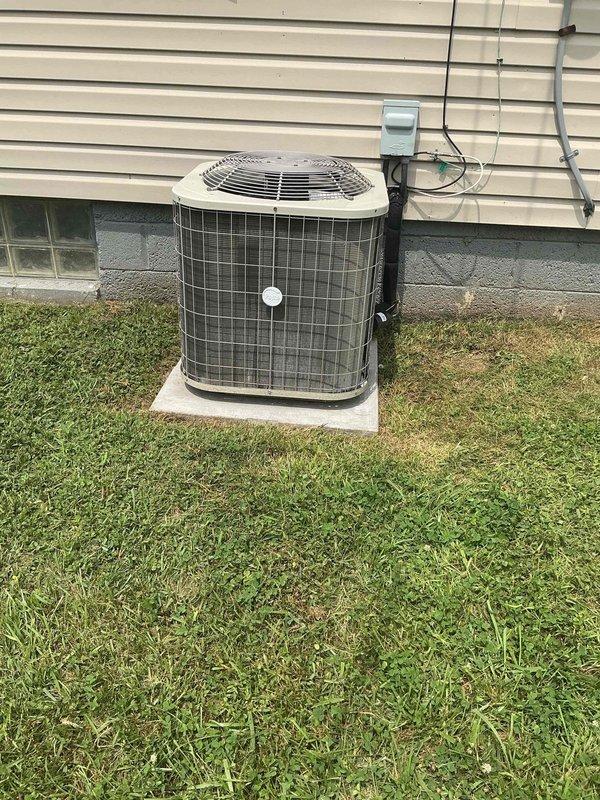 Responded to service call for central air conditioning system experiencing repeated freeze-up at outdoor condenser unit with refrigerant line icing and subsequent water leakage in basement. Upon arrival, inspected outdoor condenser unit and found system cycling improperly, causing evaporator coil to freeze and thaw repeatedly. Diagnosed restricted airflow due to dirty air filter and low refrigerant charge as primary causes of freeze-up condition. Replaced clogged air filter, checked refrigerant pressures, and identified minor refrigerant leak at service port. Recovered remaining refrigerant, repaired leak, evacuated system, and recharged to manufacturer specifications. Verified proper airflow across evaporator coil, confirmed temperature split within normal range, and tested system operation through complete cooling cycle. System now operating normally without freeze-up. Advised homeowner on importance of regular filter changes to prevent future airflow restrictions.