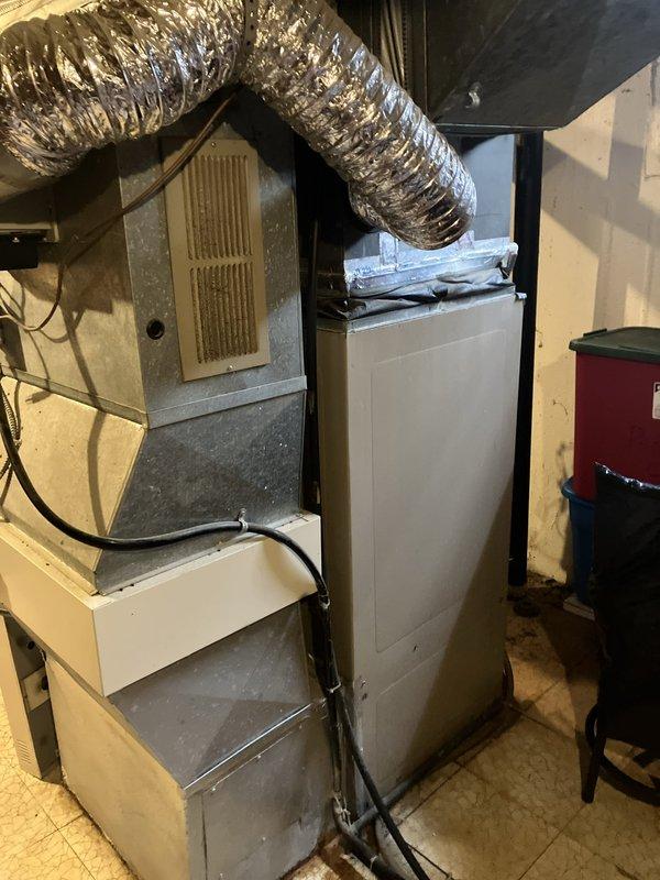 Completed full HVAC system replacement for residential property, removing existing air conditioning and furnace units that had exceeded their 10-year service life. Installed new high-efficiency furnace in basement utility area with proper venting and flexible ductwork connections to existing infrastructure. Mounted new outdoor condensing unit and established refrigerant lines between indoor and outdoor components. Verified all electrical connections, tested system operation across heating and cooling modes, and confirmed proper airflow through distribution system.
