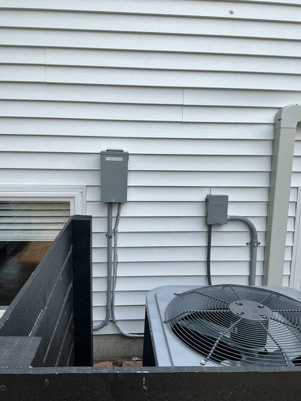 Responded to call back for hot tub breaker tripping issue. Upon arrival, inspected exterior electrical installation including breaker panel, meter enclosure, and associated conduit runs serving hot tub circuit. Documented existing electrical configuration with photos showing panel boxes, conduit routing, and connections on exterior wall near HVAC equipment. Troubleshot circuit to identify source of nuisance tripping and verified proper operation of hot tub electrical system.