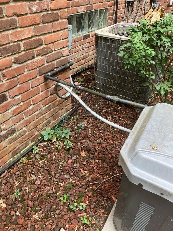 Completed electrical estimate for whole home generator replacement at residential property with existing HVAC equipment. Assessed current outdoor installation area alongside brick building, evaluated electrical service requirements, and determined optimal placement for new generator unit on existing concrete pad. Documented existing electrical conduit routing and site conditions to provide comprehensive replacement proposal for permanent standby power system.