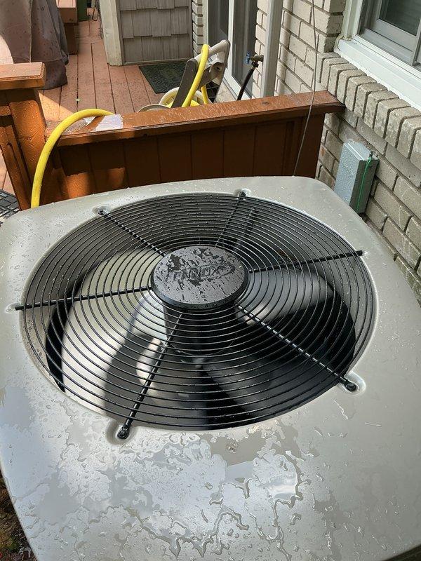 Completed comprehensive Gold AC inspection on 8-year-old residential air conditioning system with outdoor condenser unit and basement-located air handler. Performed thorough multi-point inspection of cooling system components, verified operational status of equipment, and documented current condition with photographic records. Additionally inspected 22KW Generac standby generator unit located in attic space, confirmed proper labeling and specifications, and verified connectivity features and technical ratings per manufacturer standards.