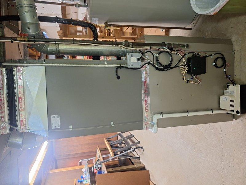 Successfully completed a 3-ton air conditioning system and evaporator coil installation in the left side yard location. The installation included a new air handler unit mounted in the basement utility area with proper electrical connections, control modules, and integration with existing ductwork. Installed a 20x25x4 filter, connected refrigerant lines with appropriate insulation, and established all necessary electrical wiring including control boxes and thermostat connections. The outdoor condensing unit was positioned in the side yard and reconnected to the indoor components. All mechanical, electrical, and air conditioning permits were requested and the system was tested for proper operation upon completion.