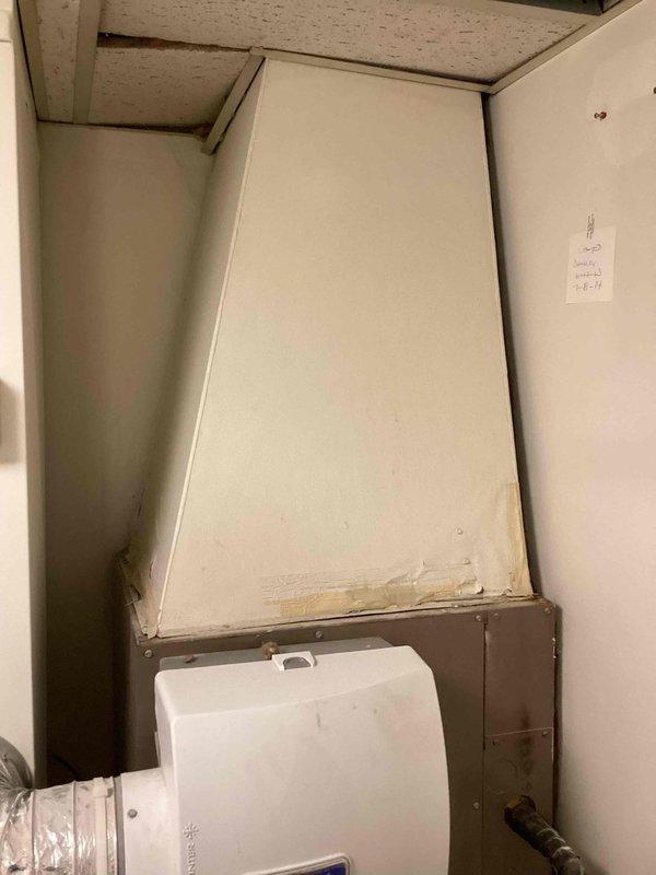 Conducted on-site assessment for full HVAC system replacement in utility room with non-operational existing equipment. Evaluated current furnace cabinet installation, ductwork connections, and electrical infrastructure to provide comprehensive estimate for new heating and cooling system replacement.
