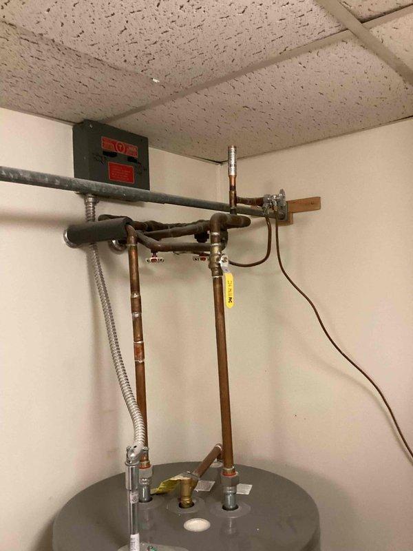 Conducted on-site assessment for full HVAC system replacement in utility room with non-operational existing equipment. Evaluated current furnace cabinet installation, ductwork connections, and electrical infrastructure to provide comprehensive estimate for new heating and cooling system replacement.
