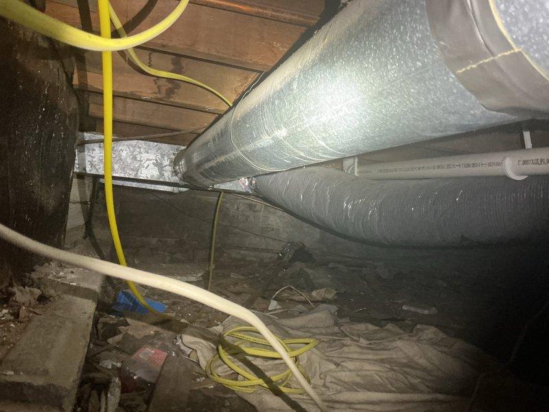Responded to water intrusion issue with wet carpet in basement. Conducted thorough inspection of crawl space and attic areas, examining HVAC ductwork, plumbing lines, and structural components to identify moisture source. Investigated PVC piping, flexible ductwork connections, and insulated supply lines for signs of leakage or condensation accumulation that could be contributing to the reported water damage.