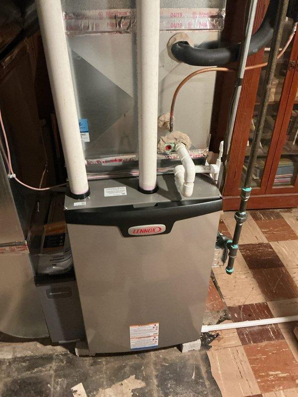 Completed scheduled tune-up on 1-year-old Lennox furnace and AC system located in basement. Replaced furnace and AC filter with highest-rated filter available per customer request, as previous filter was heavily soiled requiring quarterly replacement schedule. Performed full system inspection with no operational issues found. Discussed air purifier options with customer for future consideration.