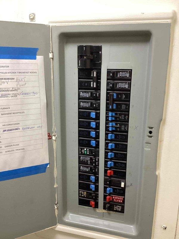 Conducted on-site assessment for whole home generator installation at residential property. Evaluated existing electrical panel configuration, documented current circuit breaker layout and capacity, and photographed electrical distribution system including circuit directory and breaker arrangement to determine compatibility and requirements for generator integration with home's electrical infrastructure.