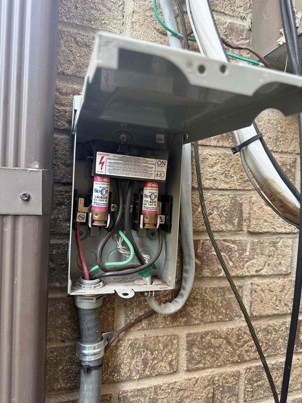 Completed comprehensive Gold AC inspection on a 3-4 year old residential air conditioning system. Performed thorough examination of outdoor condenser unit including visual assessment of cabinet condition, refrigerant line connections, and electrical disconnect components. Inspected electrical disconnect box, verified proper fusing, and checked all wiring connections for secure termination. Evaluated condenser coil fins for blockage or damage, assessed unit levelness on concrete pad, and confirmed proper drainage. Examined basement-located air handler and mini-split components, with particular attention to HEPA filter condition and replacement procedures. Verified system operational status, checked refrigerant pressures, and ensured all safety controls functioning properly. Unit operating within normal parameters with no immediate service concerns identified.