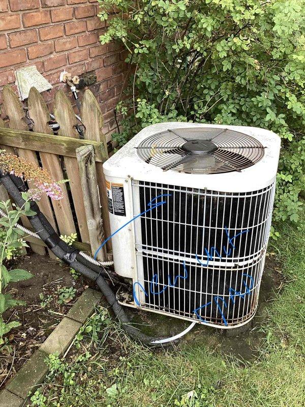 Conducted comprehensive HVAC replacement estimate for residential property where existing 20+ year old air conditioning system experienced catastrophic failure due to fire damage. Assessed outdoor condenser unit positioned on concrete pad in backyard, noting severe damage to electrical components and complete system failure. Evaluated indoor air handler and ductwork infrastructure, including existing Comfortmaker furnace unit and galvanized sheet metal distribution system in mechanical room. Documented current system configuration, refrigerant line routing, electrical connections, and ductwork layout to provide accurate replacement specifications. Recommended complete system replacement due to age of equipment, fire damage to critical components, and safety concerns with continued operation of compromised unit.