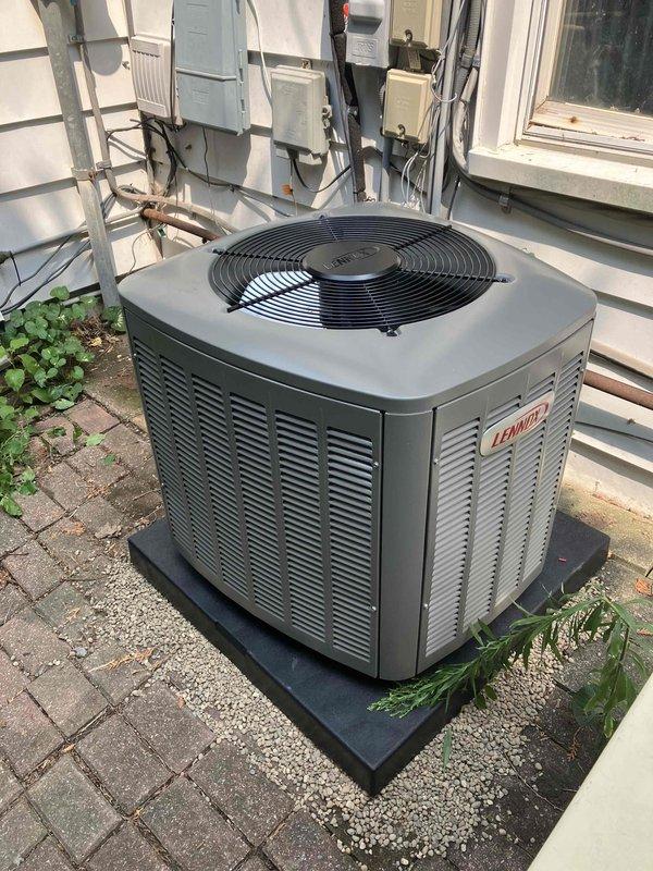 Completed full HVAC system installation including a 70,000 BTU Lennox furnace and 1.5-ton Lennox air conditioning unit with rear discharge configuration. Installed furnace in interior utility closet with proper venting, exhaust flue, condensate drainage system using PVC piping, and electrical connections including control wiring and disconnect. Mounted AC condensing unit on rubber isolation pad against exterior wall with appropriate clearances, installed electrical disconnect box, and completed refrigerant line connections. System installation included condensate pump, drain pan with wet switch safety device, and complete line set flush prior to charging. Requested and coordinated mechanical and electrical permits for the installation. Reconnected all electrical components to code specifications. Performed complete system startup, verified proper operation of both heating and cooling cycles, and confirmed all safety devices functioning correctly.